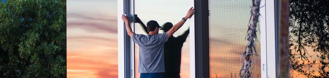 Man in front of Window